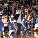 CELEBRATE TIME — The C-L Lions react after winning Tuesday night's game against Vincentian at Sharon High School. (Photo by George Powers)
